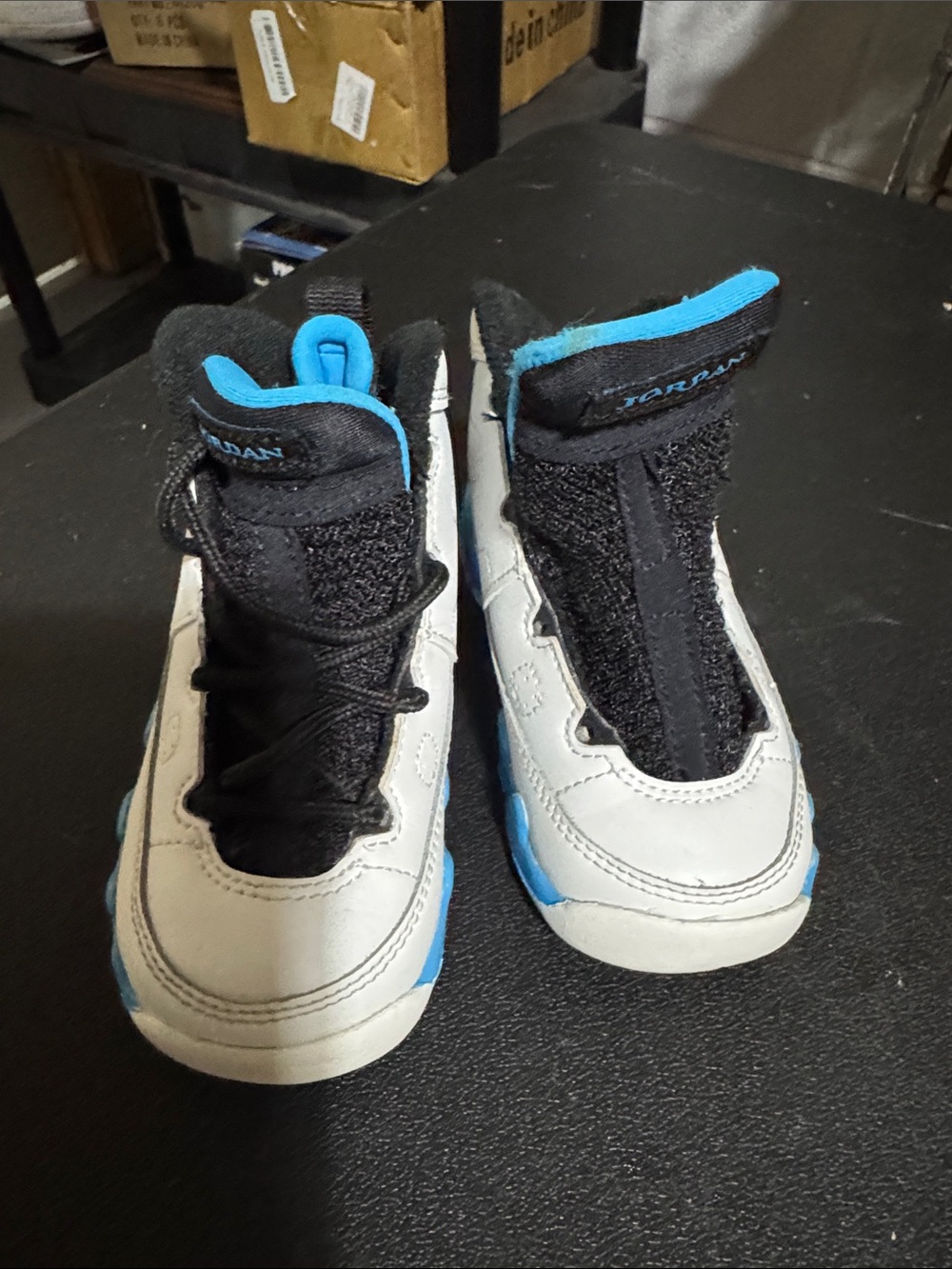 Jordan Kids Black, White and Blue High-Top Sneakers